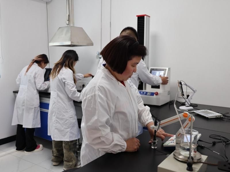 Asian Agro research team conducting laboratory evaluation of agricultural formulations